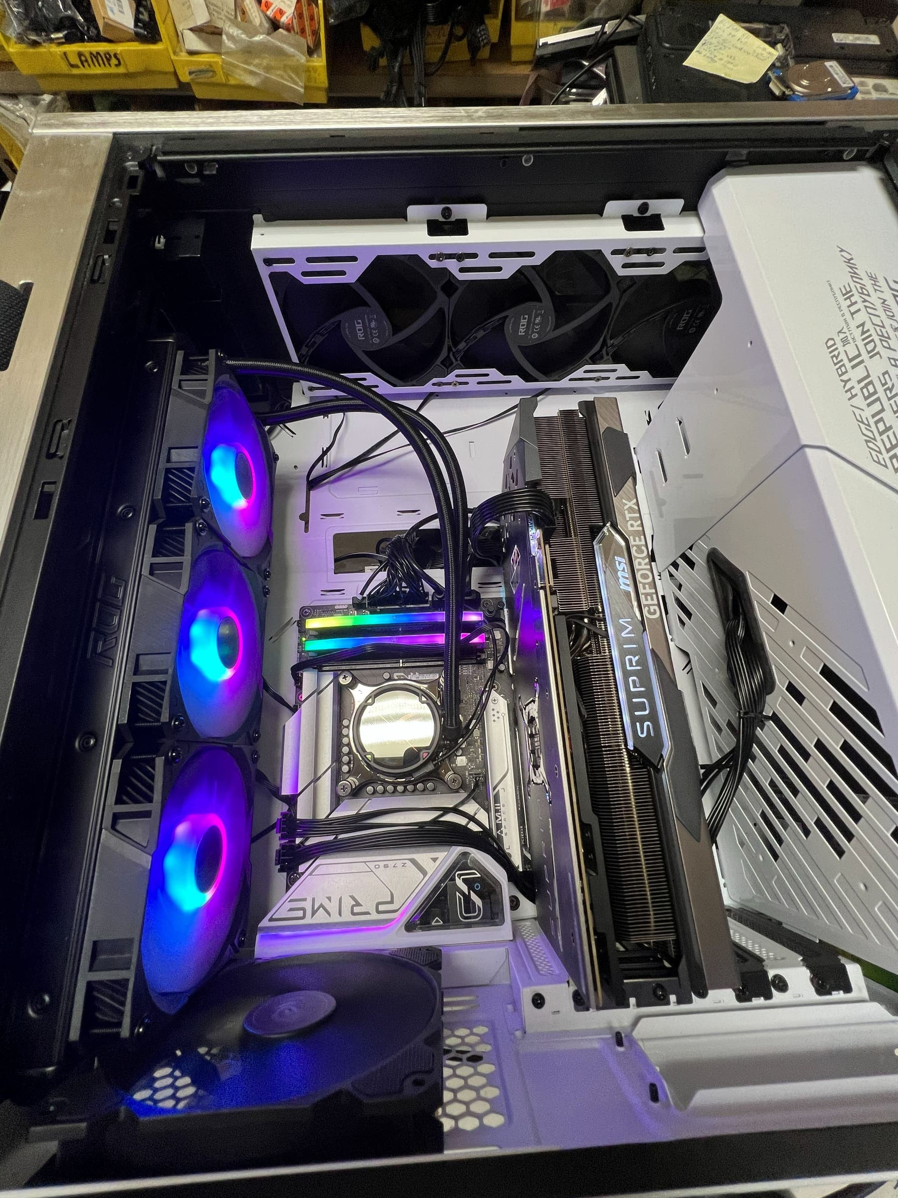 Custom RGB-lit gaming PC build with purple-themed fans at Technoland